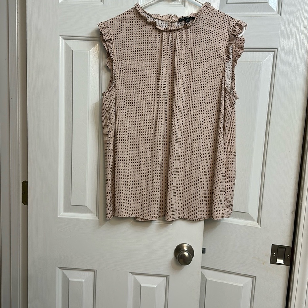 Ruffled Sleeveless Blouse